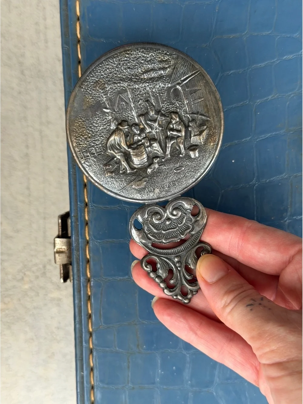 Vintage Decorative Hand Mirror with Engraved Scene and Ornate Handle